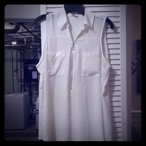 Sleeveless blouse with half zip front